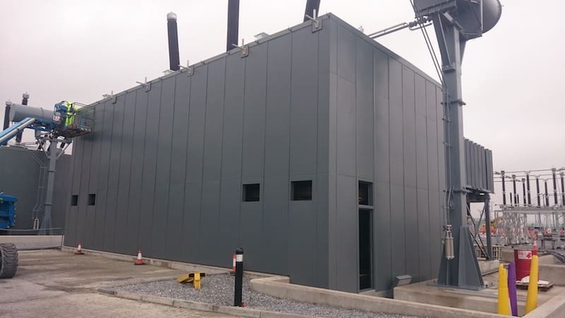 team working on site during an installation of an acoustic enclosure